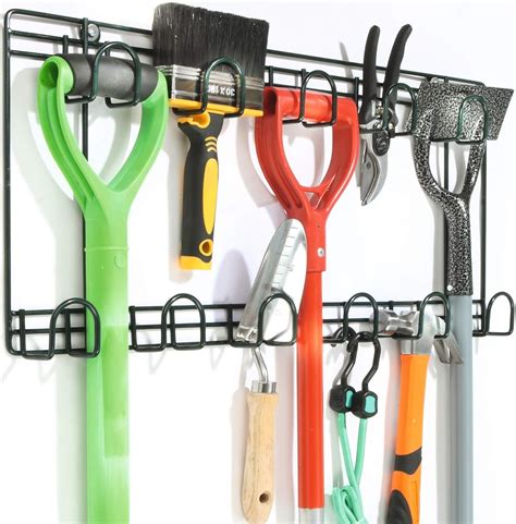 metal wall brackets for tools|hanging tools on garage wall.